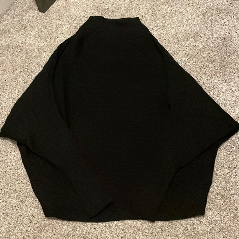 Black turtle neck sweater